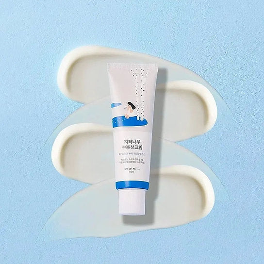 Birch Juice zoncrème SPF50+ tube met witte crèmeklodders