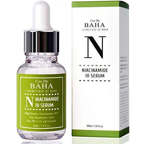 Niacinamide-serumflacon met groene etikets en bijpassende kartonnen doos