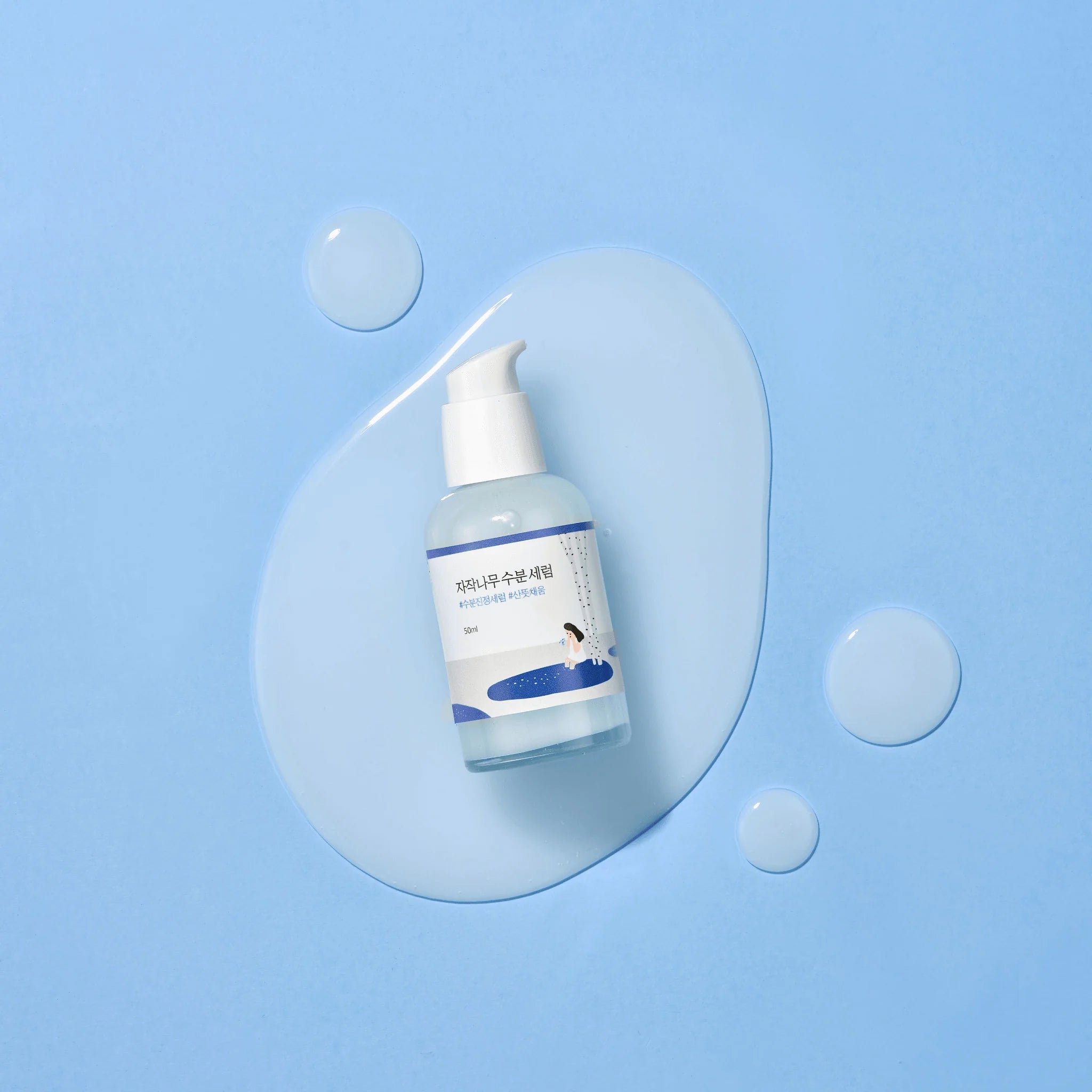 Round Lab berksapserum in witte pompflacon