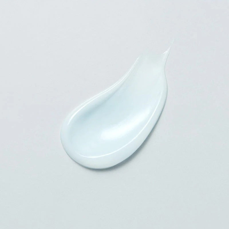 Kalmerende crème swatch met glanzende, witte textuur