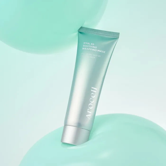 Arocell Hyal B5 Soothing Wrapping Mask tube staand tussen mintgroene cirkels op lichte achtergrond