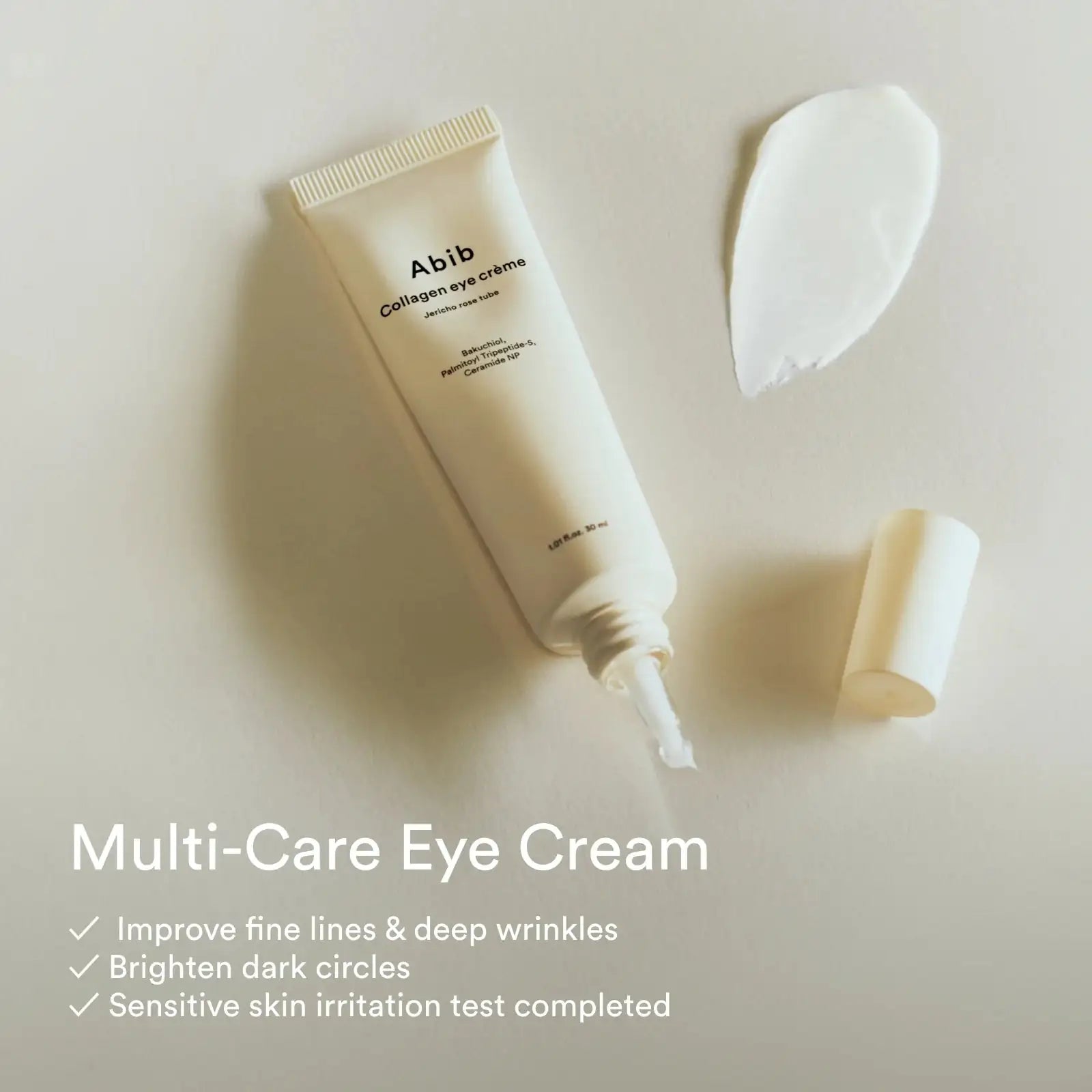 Abib Collagen eye creme Jericho Rose Tube Abib collageen oogcrème tube met tuit en witte crème op spatel