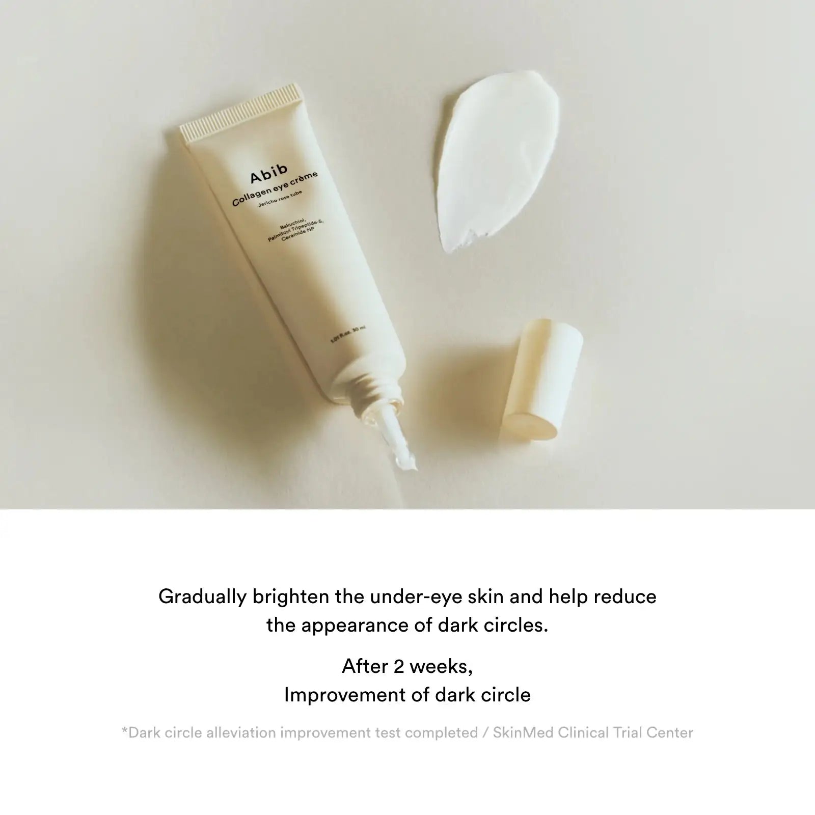 Abib Collagen eye creme Jericho Rose Tube Abib collageen oogcrème tube met uitgedraaide witte crème op spatel