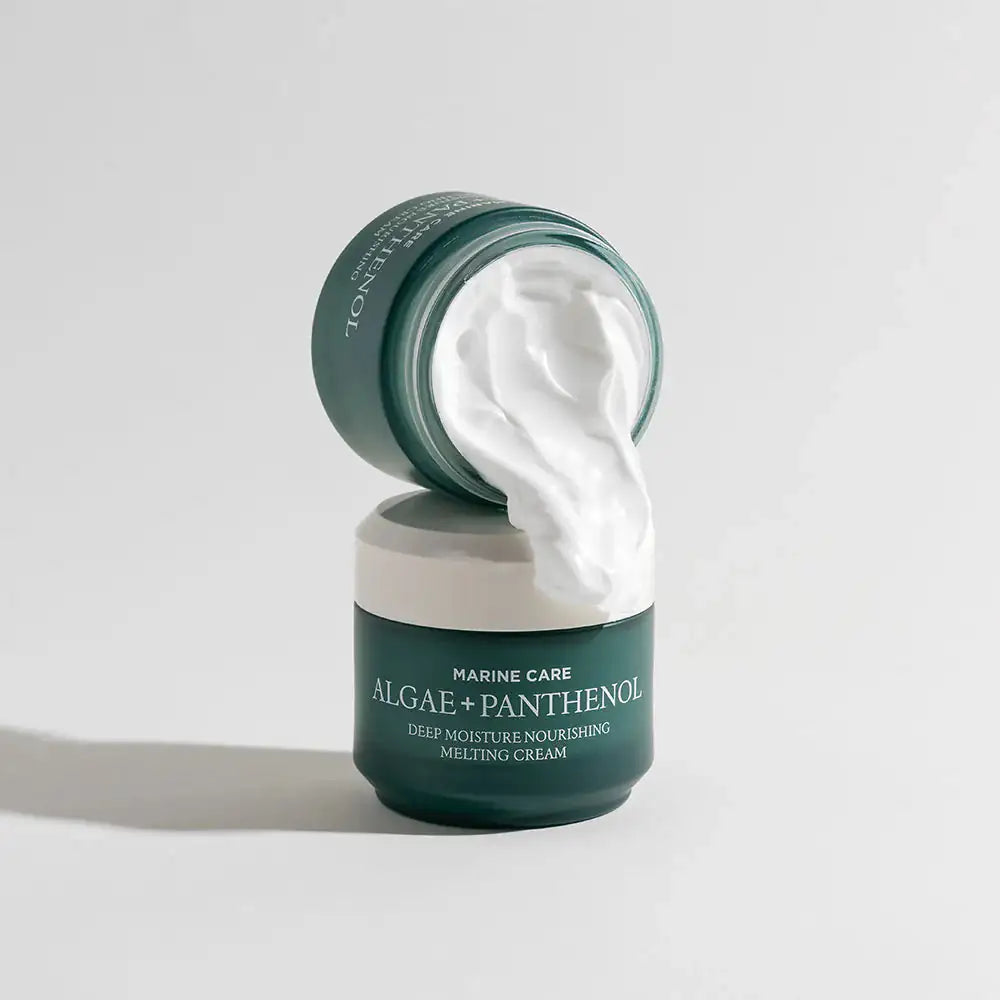 Marine Care smeltcrème in donkergroene pot, open, met dikke witte creme op rand