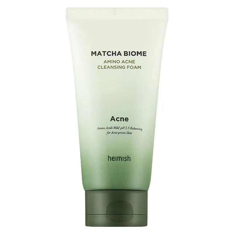 Reinigingsfoam tube in wit en groen, met ronde dop en label 'Acne'