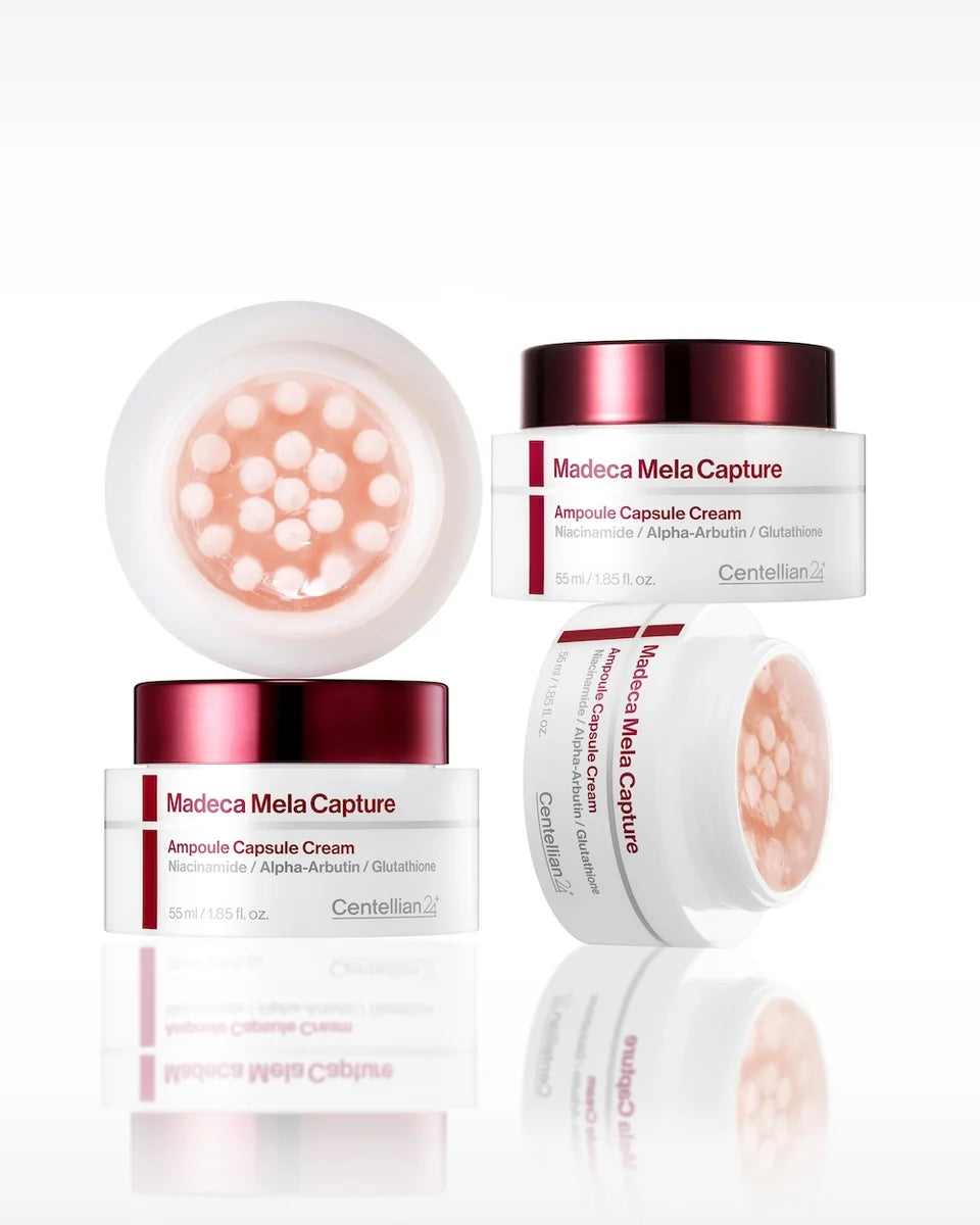 Lifestylefoto van meerdere potten Centellian24 Madeca Mela Capture Ampoule Capsule Cream met zichtbare ampulcapsules.⠋
