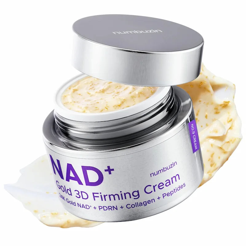 Open pot Numbuzin No.9 NAD+ Gold 3D Firming Cream met een romige textuur en goudkleurige deeltjes.