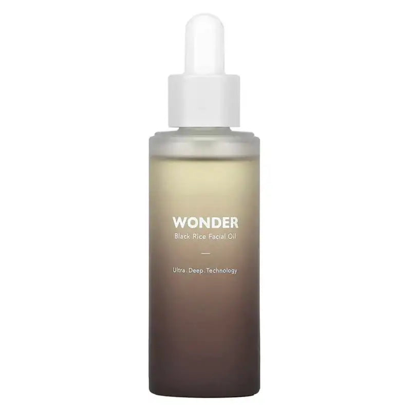 Haruharu WONDER Black Rice Facial Oil Gezichtsolieflacon met druppelpipet en donkere amber vloeistof