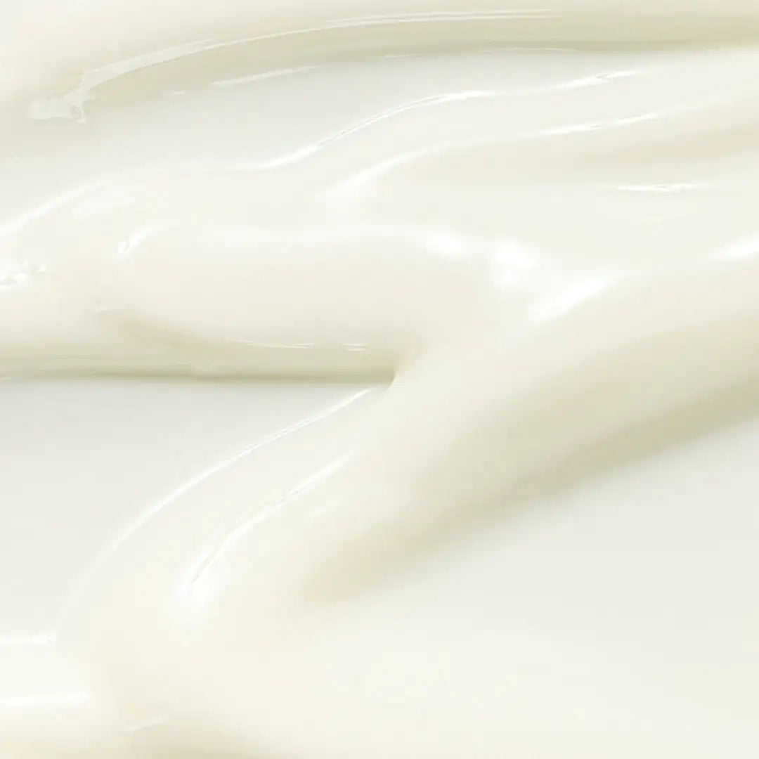 Beauty of Joseon Relief Sun Rice Probiotics - SPF50+/PA++++ Romige witte crèmestructuur, uitgesmeerd als smeerlaag