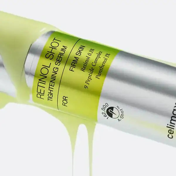 Celimax The Vita A Retinol Shot Tightening Serum Retinol Shot stramingsserum fles met geel etiket en smeeruitloop