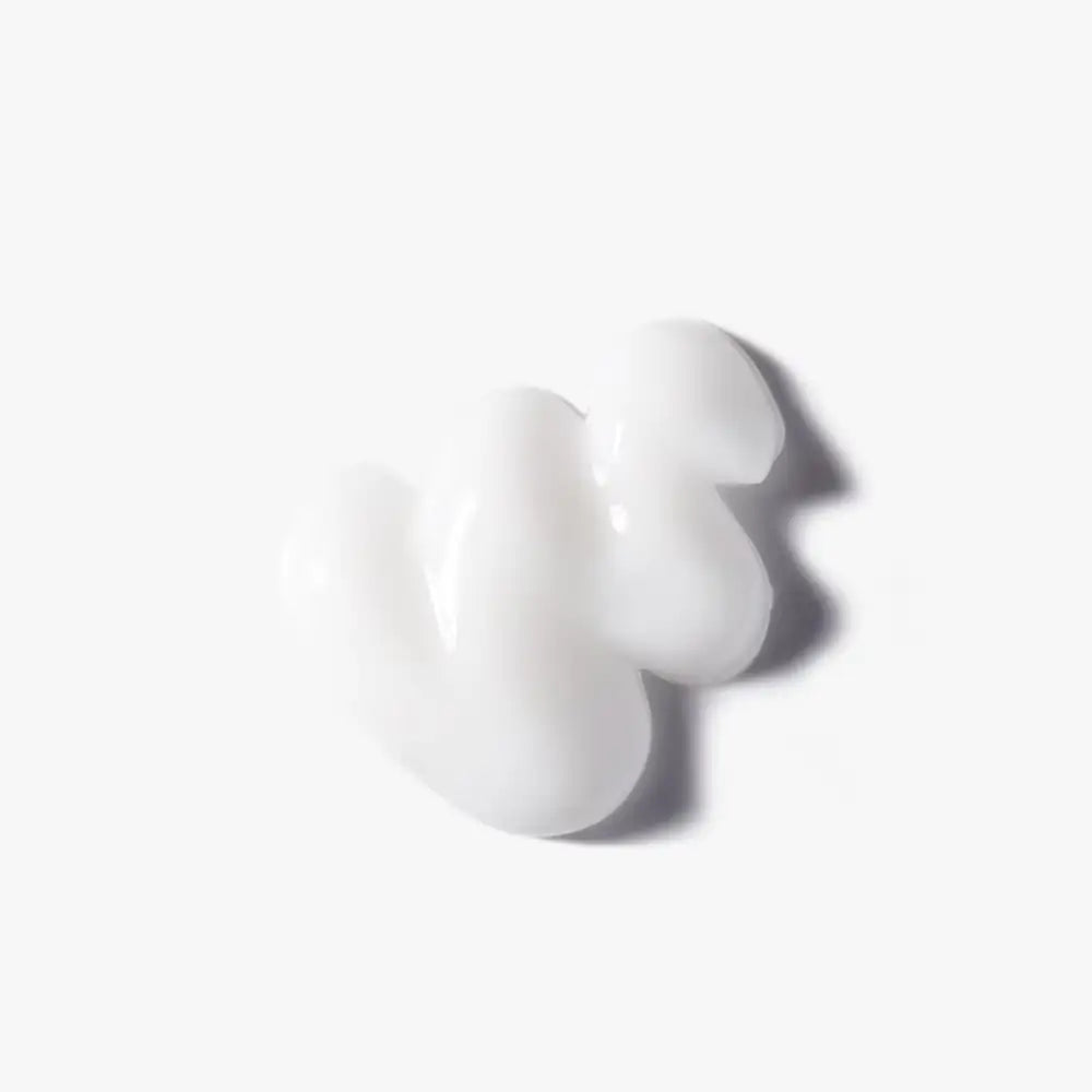 Dr. Jart+ Ctrl-A Teatreement Moisturizer Twee klodders witte crème op een glad oppervlak