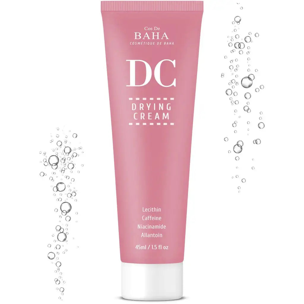 Roze DC-drogende crème tube met witte basis, met waterdruppels eromheen